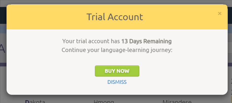 A pop-up with a bright yellow heading reading "Trial Account", above text reading "Your trial account has 13 days remaining. Continue your language learning journey:", then a green "Buy now" button and a "Dismiss" link.